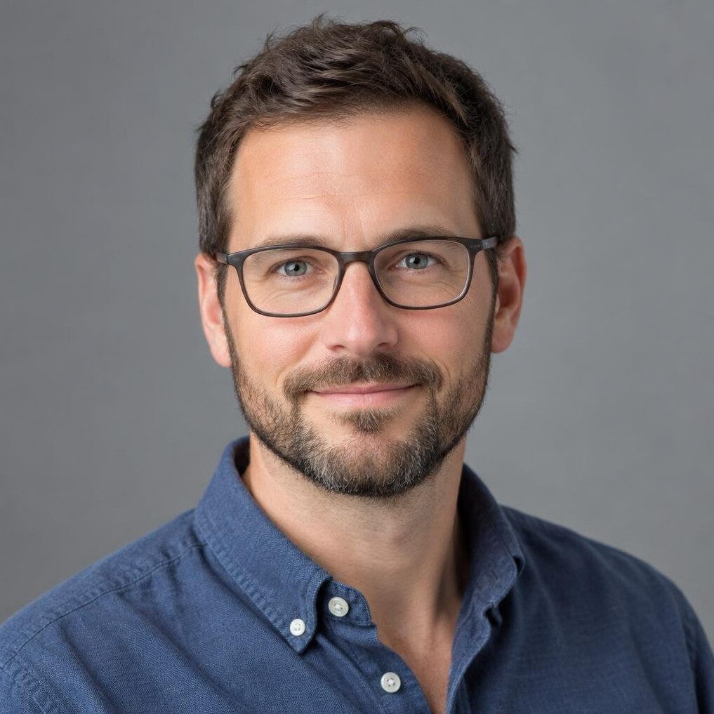 Studio portrait of a man data researcher with glasses